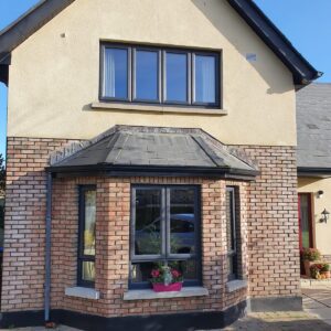 Energy-efficient PVC grey on white double glazed casement windows
