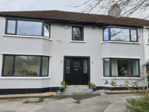 Front view of home with pvc windows and composite door