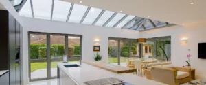 A home with fixed skylight windows in the living room, kitchen, and dining area