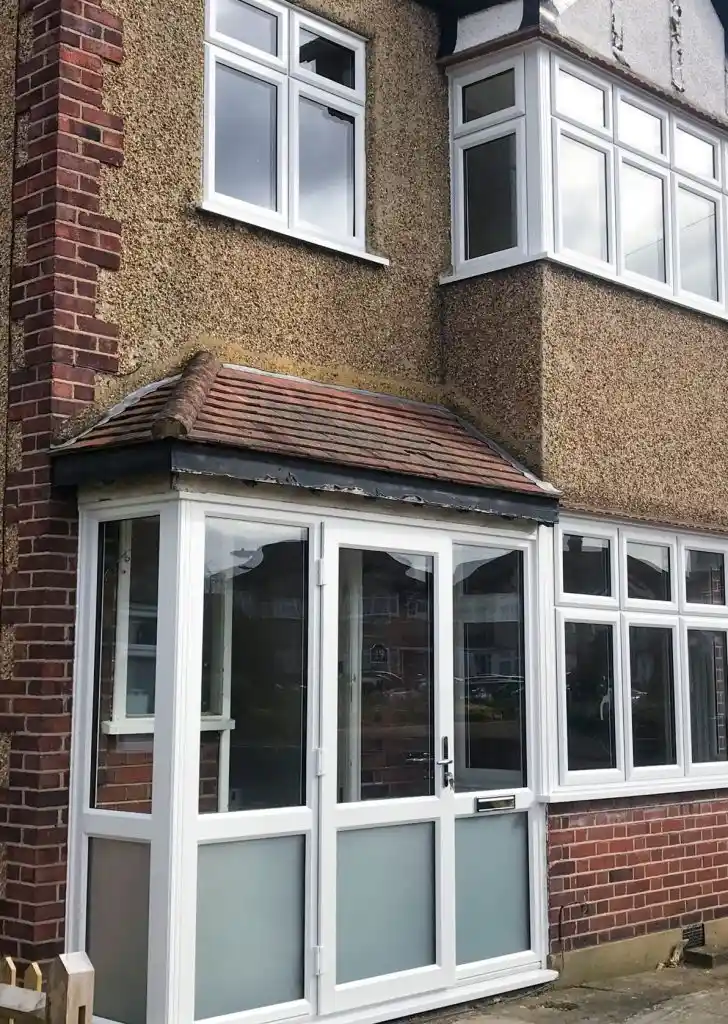 New PVC cream sash windows installed, complementing front doors for improved insulation.